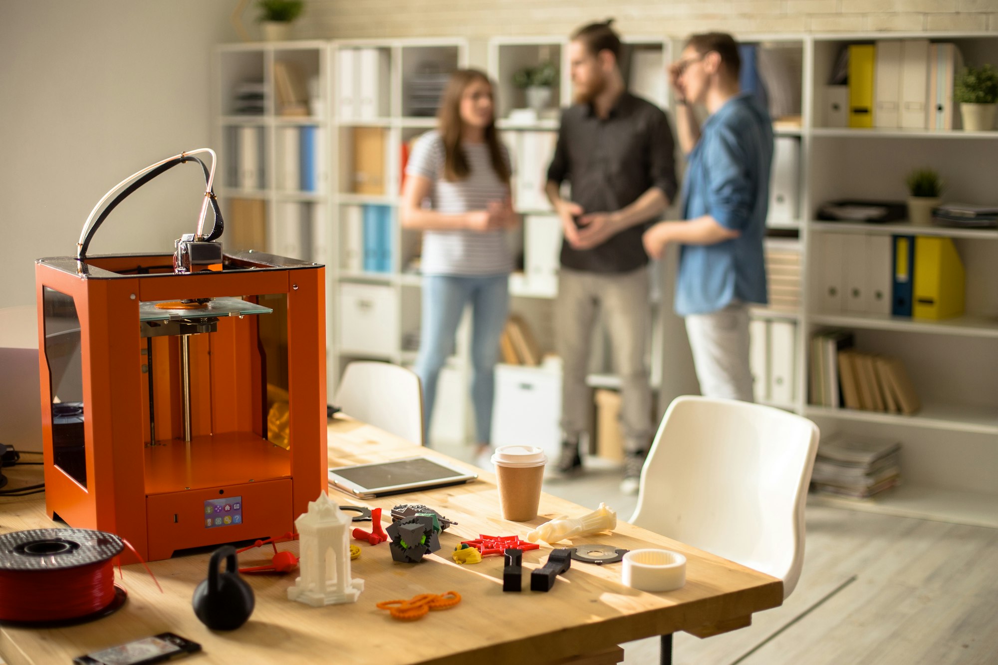 3D Printer on Table in Modern Design Studio