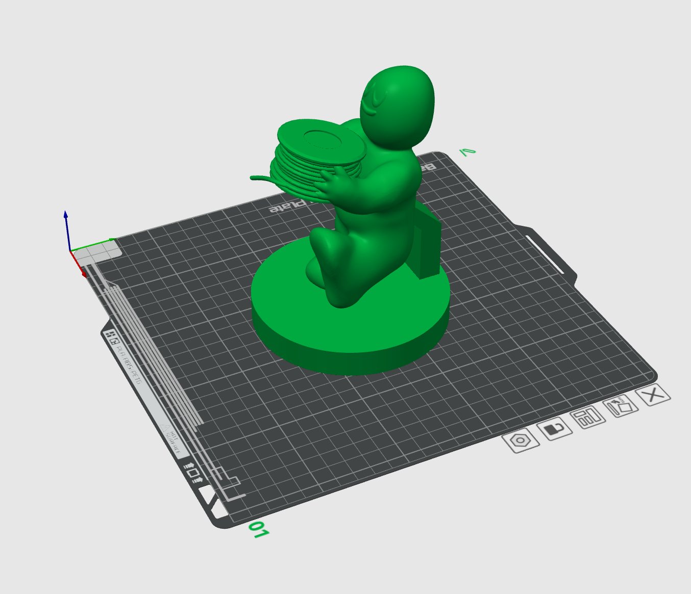 Figurine tirée d'un logo, préparée sur le plateau d'impression 3D