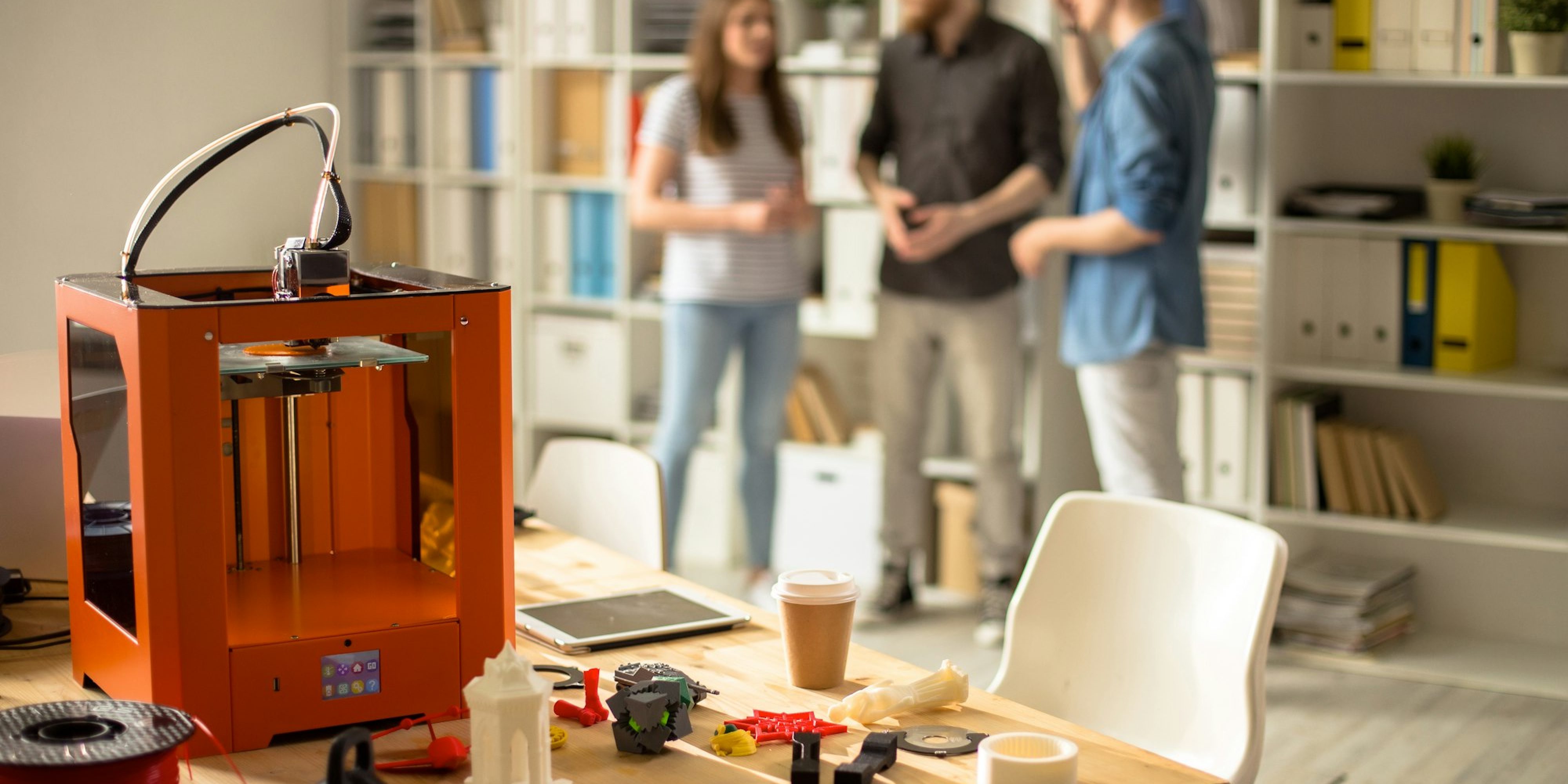 3D Printer on Table in Modern Design Studio